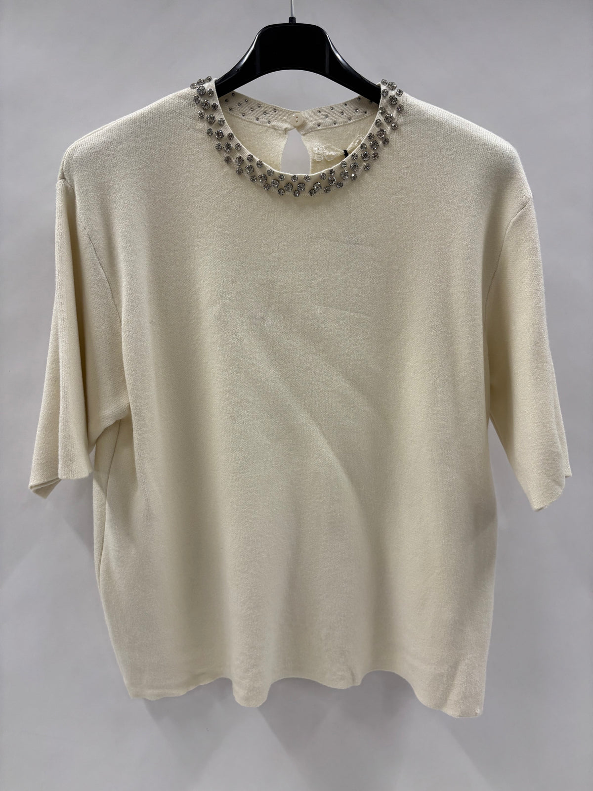 Strikbluse, Blinghals