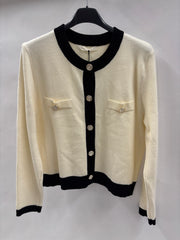 Strikjakke, Guldknapper